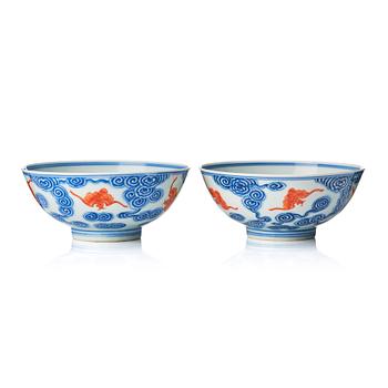 1290. A pair of Chinese blue and white 'bats' bowl, Republic period, 20th Century.