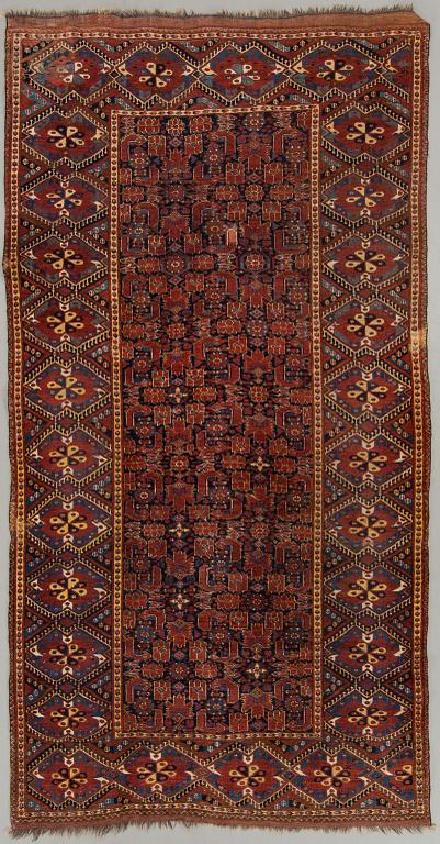 An antique Karabagh carpet ca 318 x 168 cm.