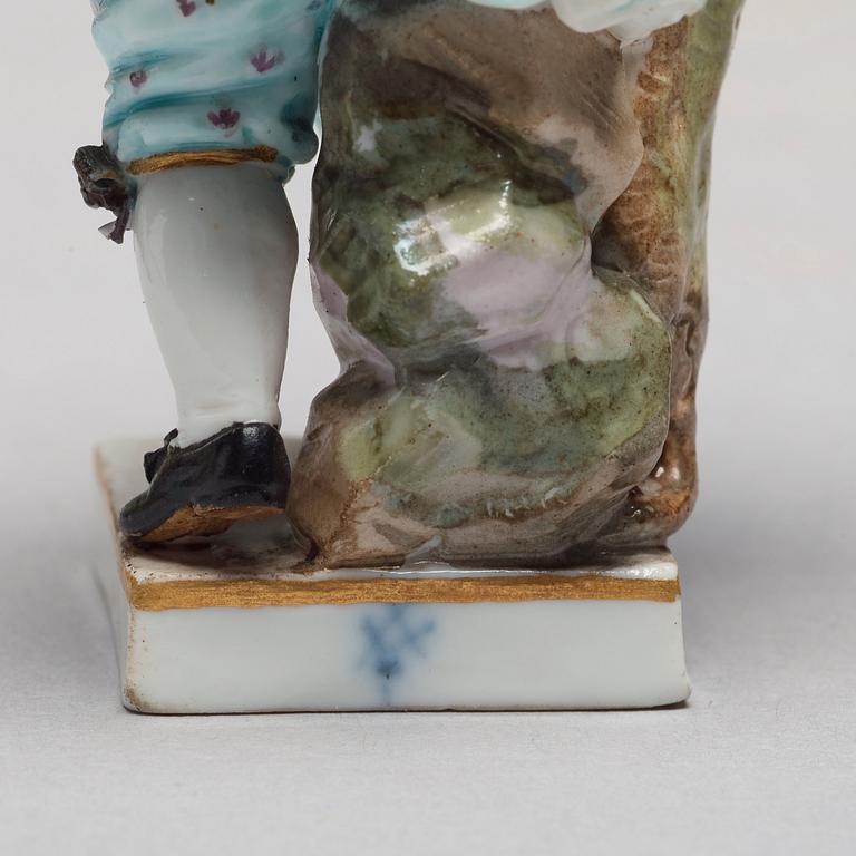 A group of five porcelain figurines of children, Meissen and Vienna.