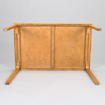 Alvar Aalto, a 1950's '82' table and six '66' stools for O.Y. Huonekalu-ja Rakennustyötehdas A.B.