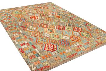 A Kilim carpet, c. 377 x 278 cm.