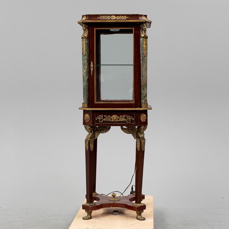 An Empire style cabinet, mid 20th Century.