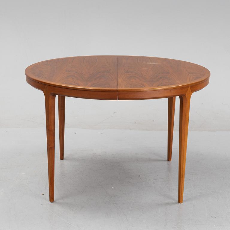 A walnut dining table by Bertil Fridhagen, Bodafors, 1960's.