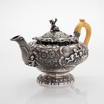 A Georgian seven-piece, sterling silver tea and coffee set, maker's mark of Joseph Angell, London 1817-1823.