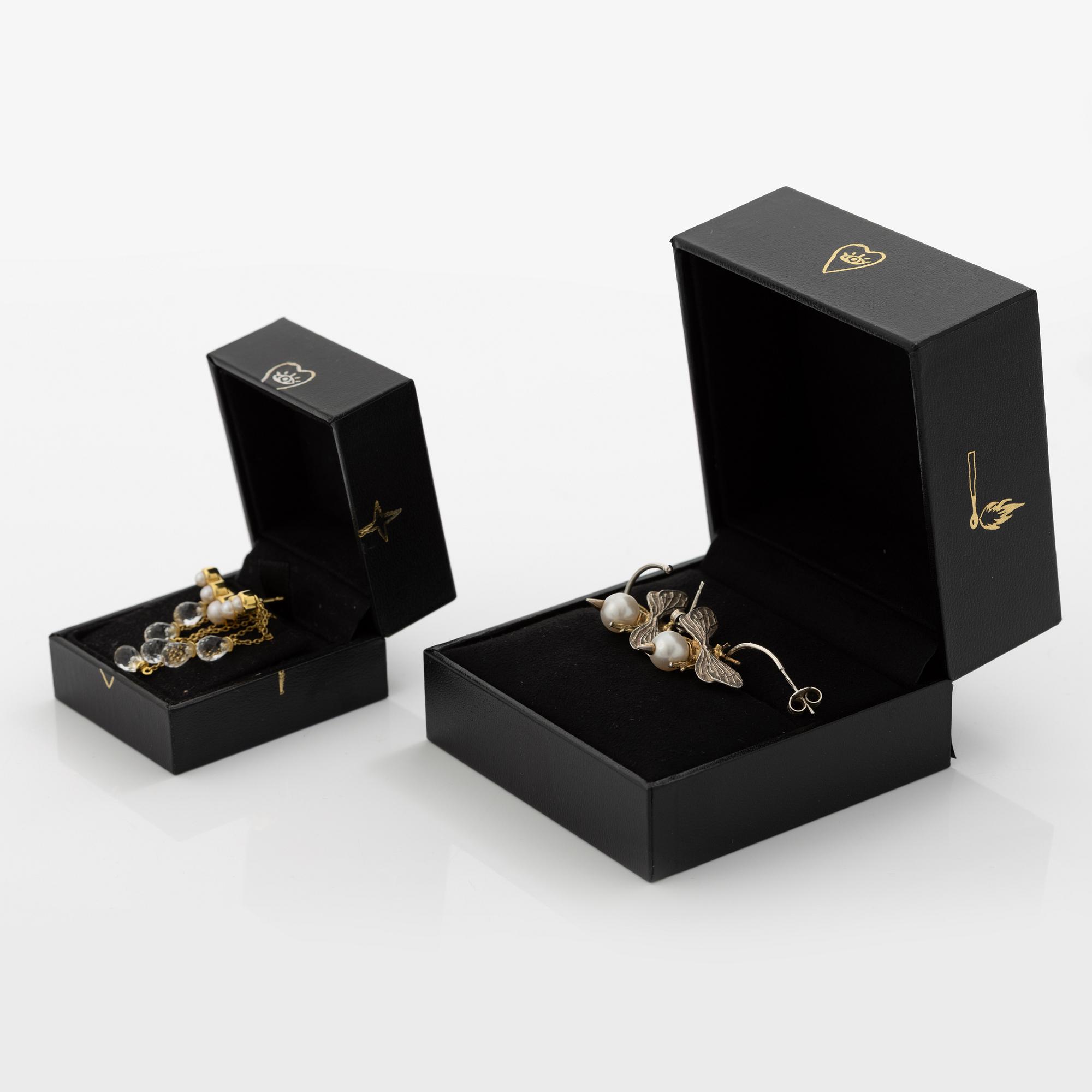 Maria Nilsdotter, a single earring, "rain earring" and a pair, silver with pearls and quartz.
