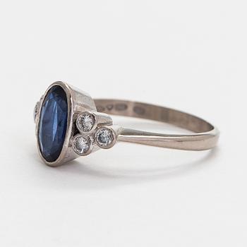 A. Tillander, ring, faceted sapphire, brilliant cut diamonds, 18K white gold, Helsinki 1983.