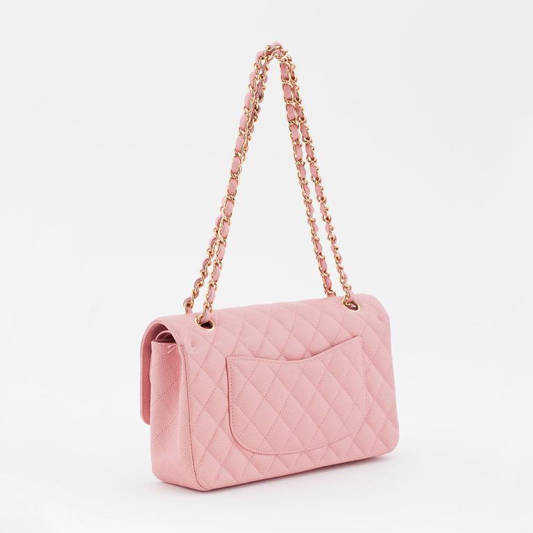 CHANEL, a pink caviar leather "double flap" shoulder bag.