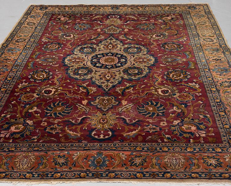 A carpet, semi-antique Tabriz, ca 357,5 x 256 cm.