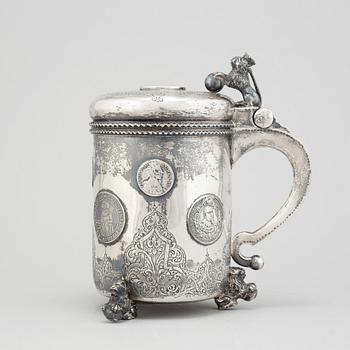 A parcel-gilt silver baroque style tankard.