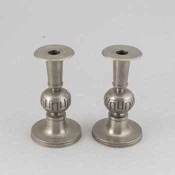 A pair of pewter candle holders by Edvin Ollers, 1952.