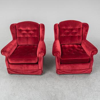 Apair of easy chairs.