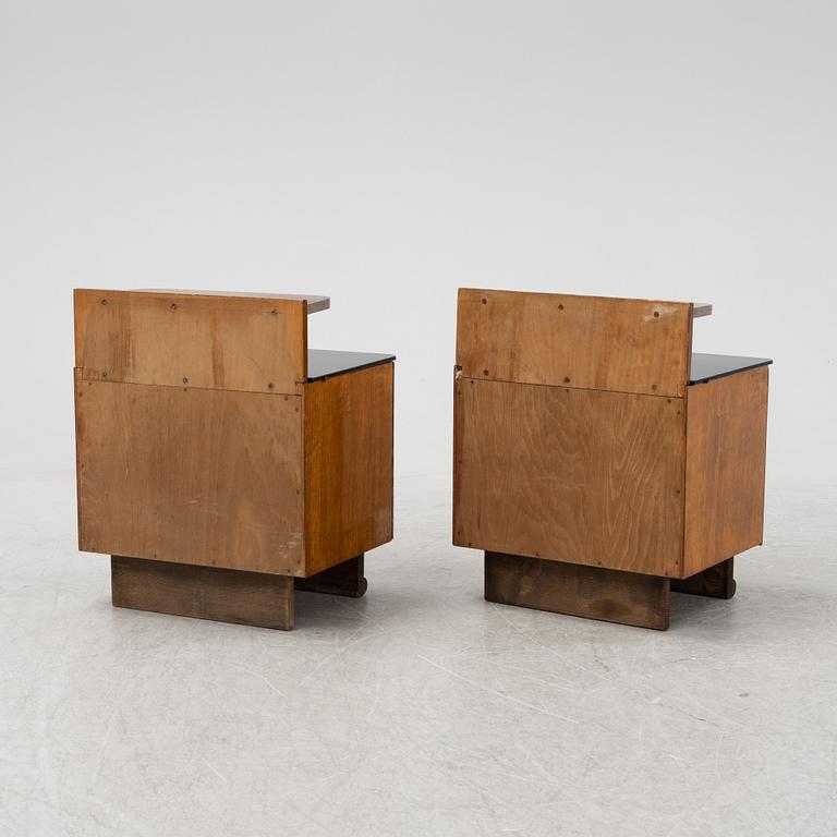 A pair of walnut veneered bedside tables, 1930's/40's.