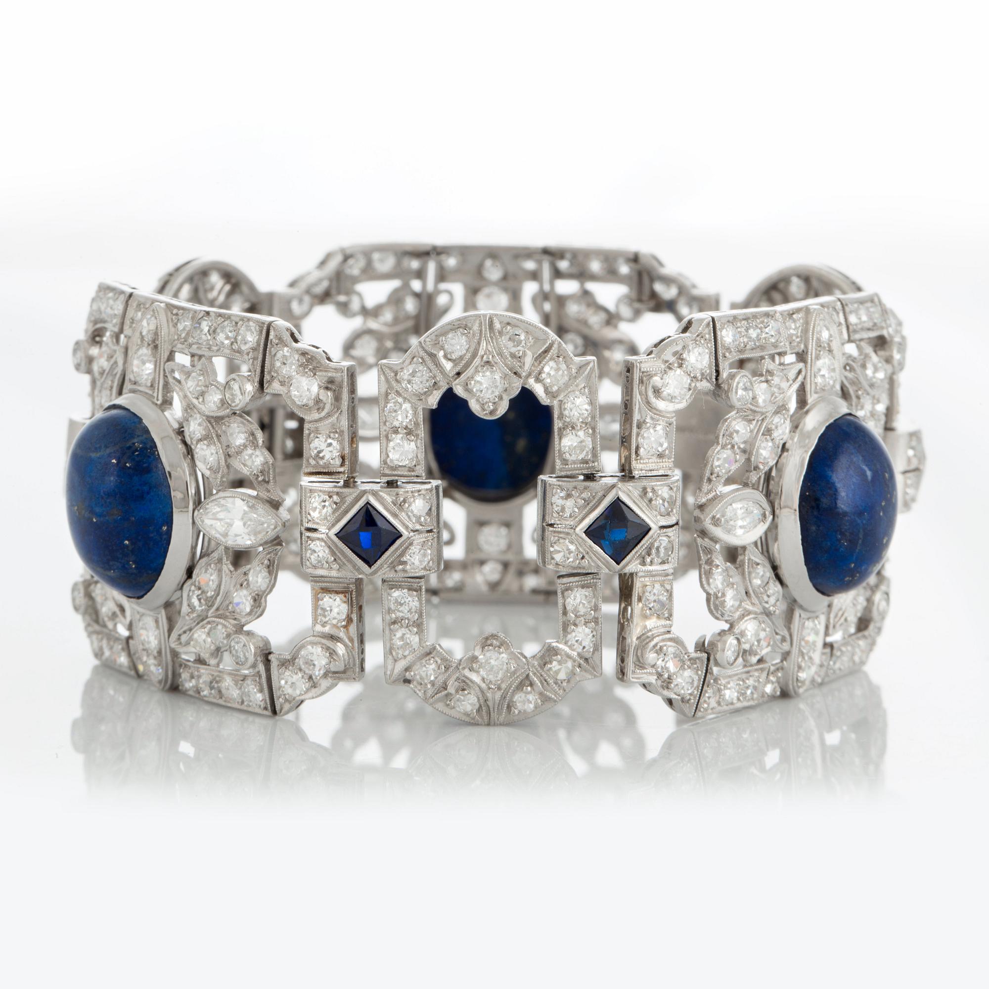 A platinum bracelet set with lapis lazuli, old-cut diamonds with a total weight of ca 10 cts and synthetic sapphires.