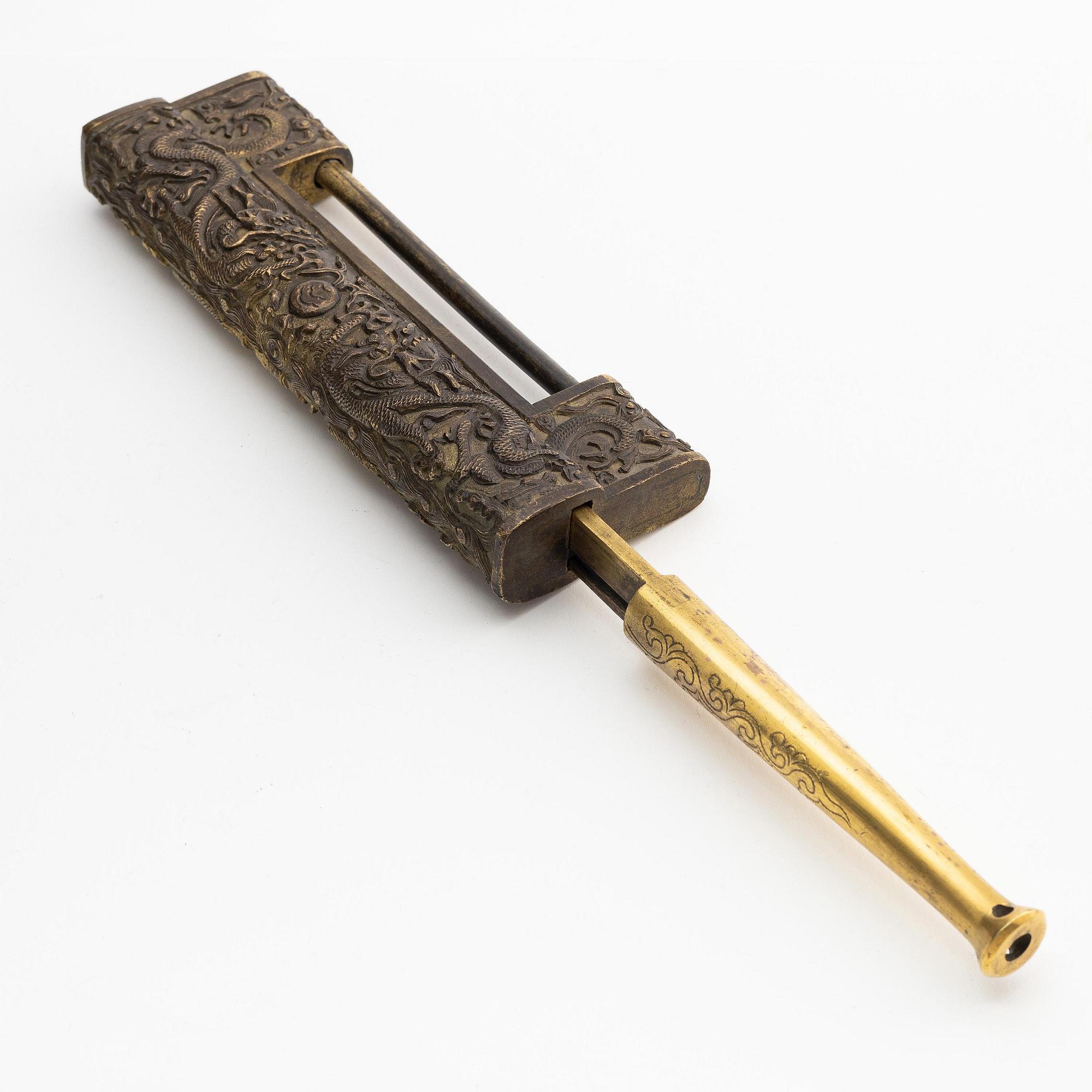 A Chinese gilt five-clawed 'dragon' lock, Qing dynasty, Qianlong (1736-95).
