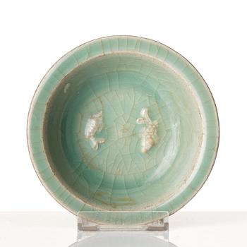 A celadon glazed double fish bowl, Yuan dynasty.