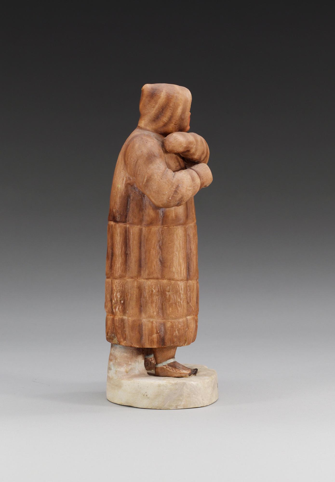 A Russian figure of a Eijnar laplander man, unmarked, ca 1900.