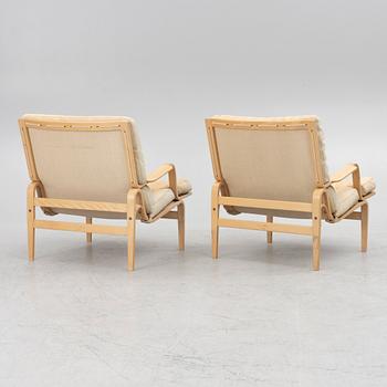 Bruno Mathsson, a pair of 'Ingrid' armchairs, Dux.