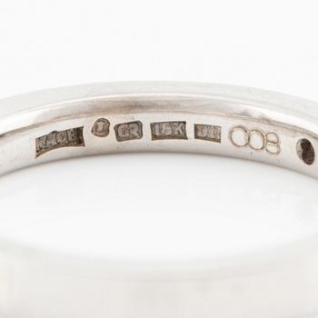 Ring 18K vitguld med prinsesslipade diamanter.