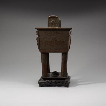 A large bornze censer, Qing dynasty with inscription.