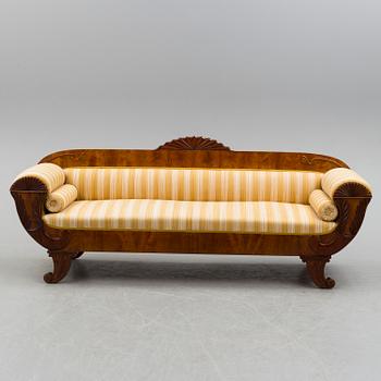 A mahogany sofa dated 1840.