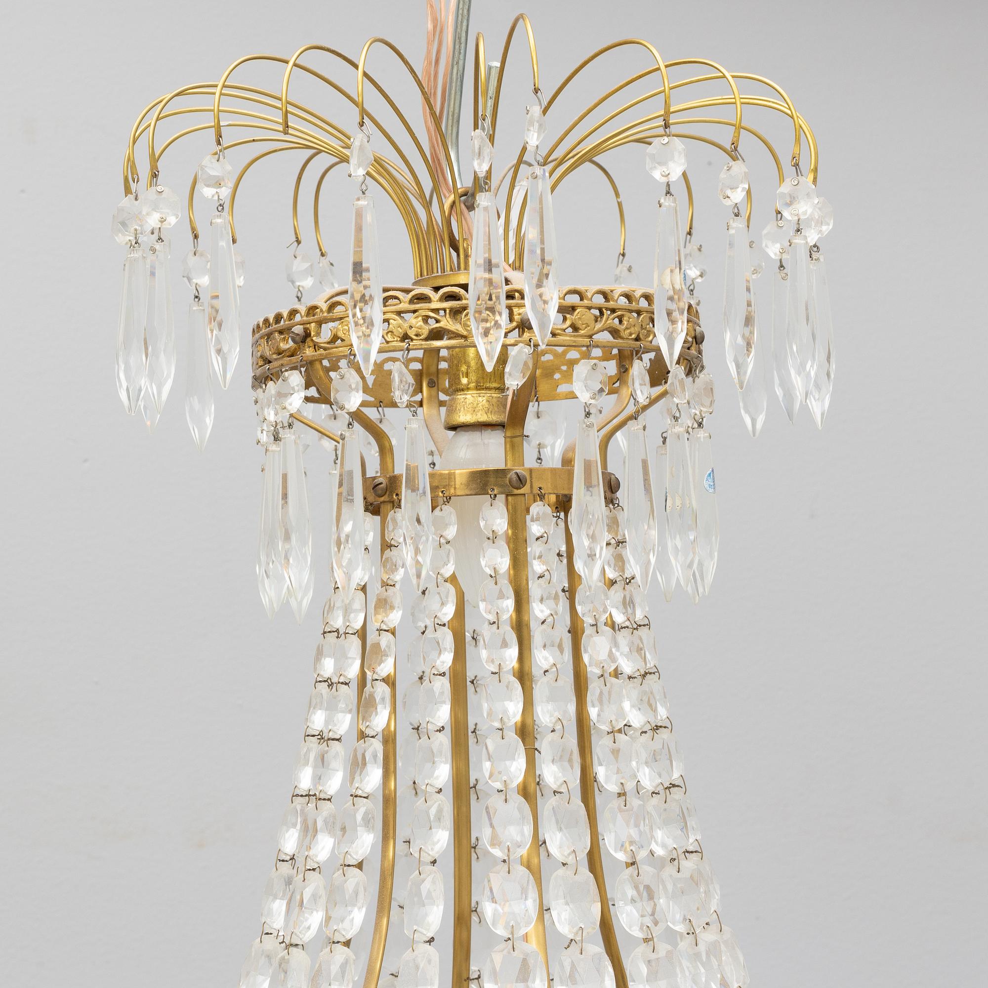 An Empire style chandelier, first half of the 20th Century.