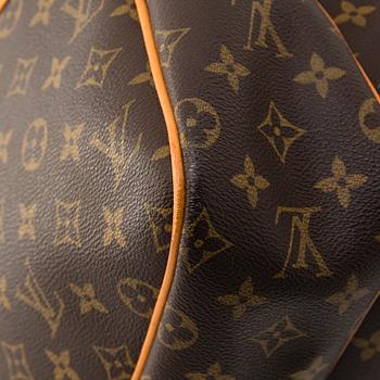 Louis Vuitton, a Monogram Canvas 'Reporter GM' bag.