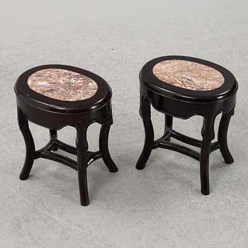 A pair of black-lacquered stools, Japan, around 1900.