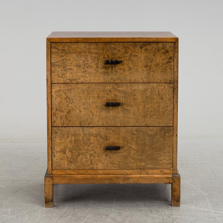 AXEL LARSSON, a stained birch chest of drawers from Svenska Möbelfabriken, 1930's.