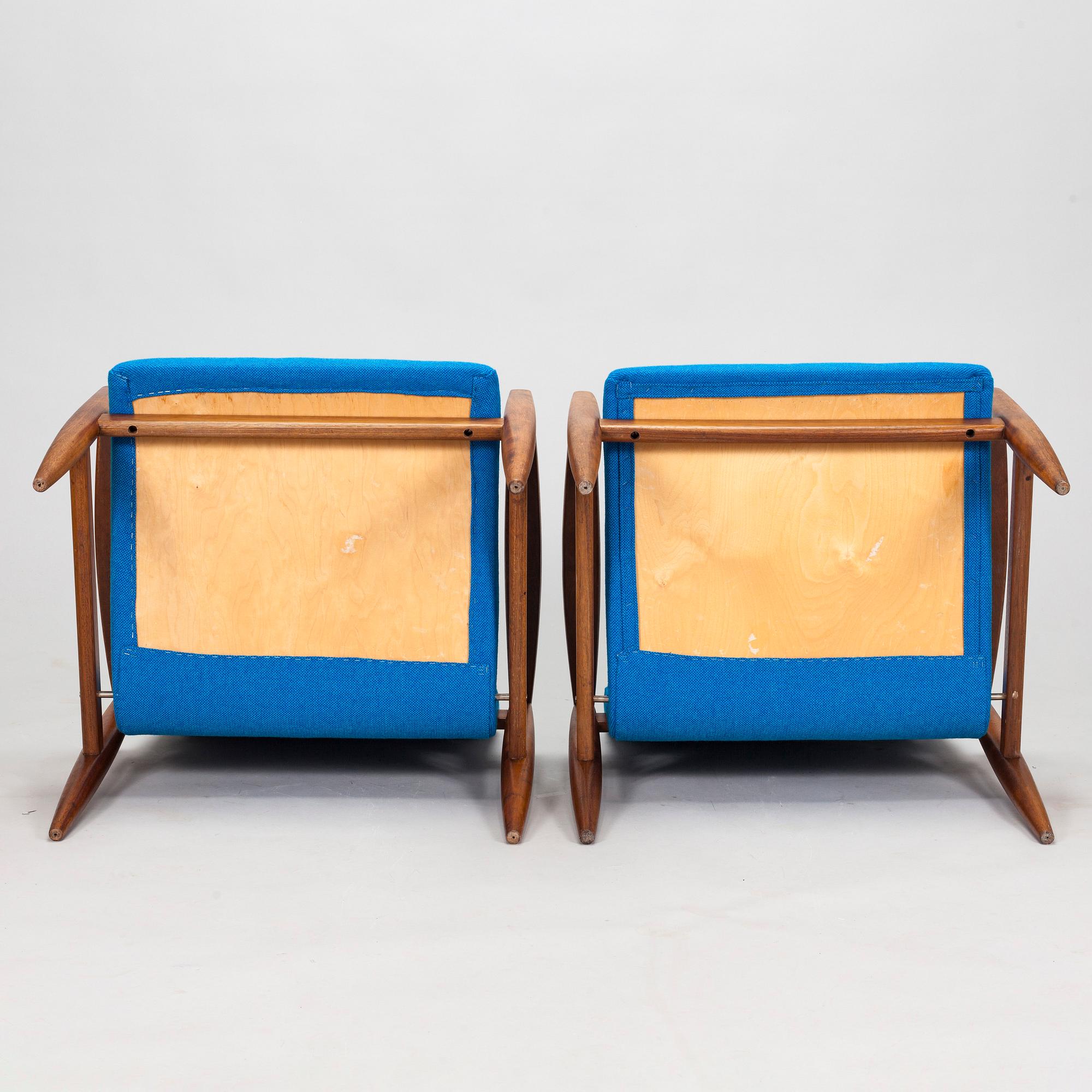 A pair of 1950's armchairs.