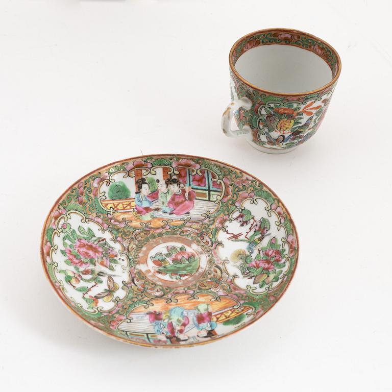 A group of four Canton plates (2+1+1) and a cup with saucer, 19th century.