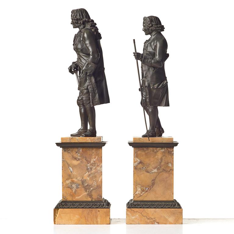 A pair of French bronze figures, circa 1825.