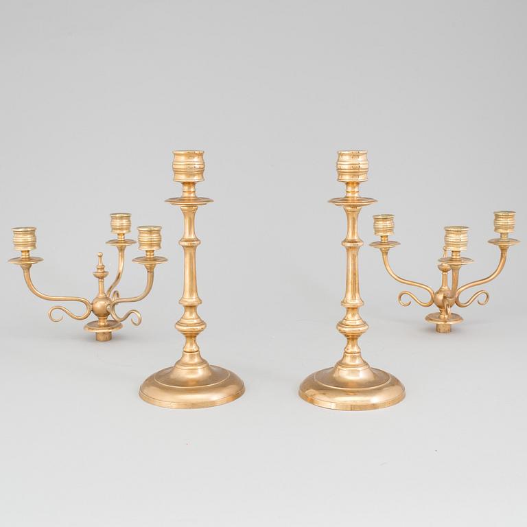 A pair of Candelabra, in brass Westerås Metallfabriks AB, late 19th century.