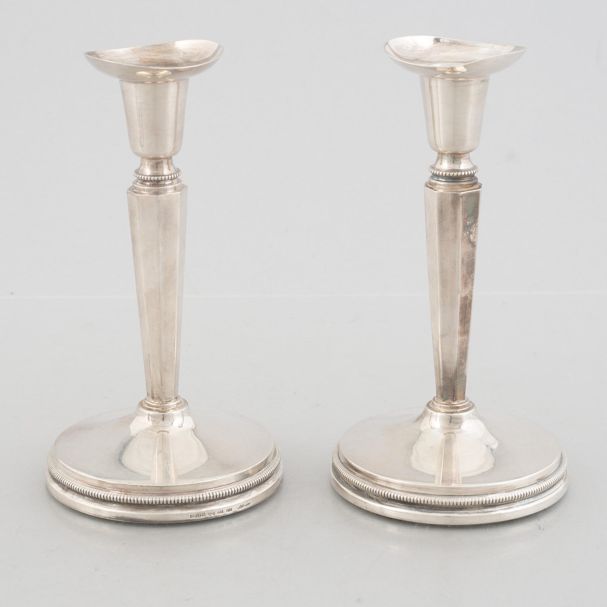 Two pairs of Swedish silver candlesticks, including Eric Löfman, MGAB, Uppsala 1979-1982.
