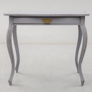 A circa 1900 Rococo style writing desk.