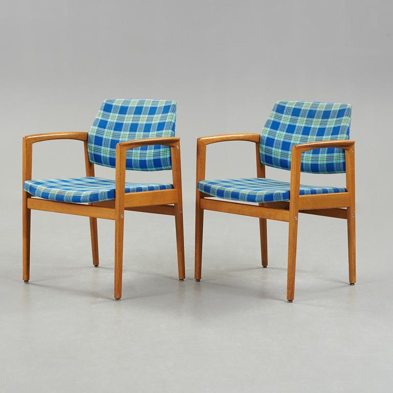 A pair of mid 20th century armchairs.