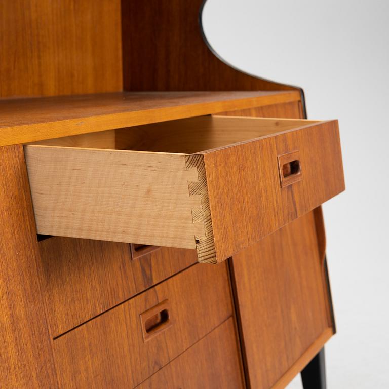 A teak-veneered bookcase, 1950's.