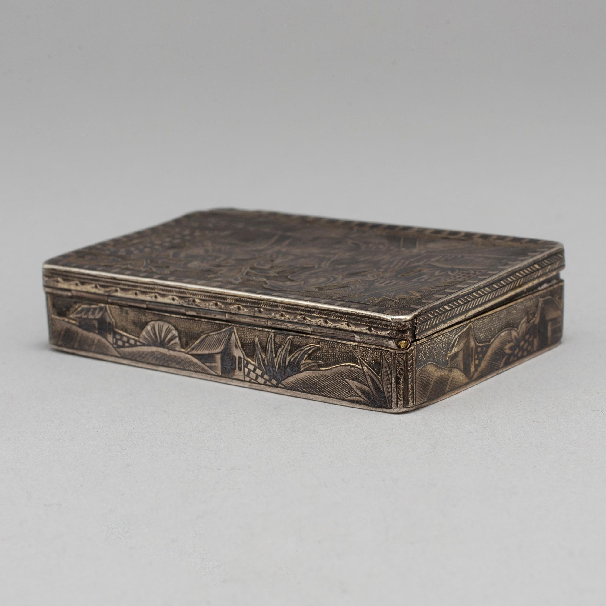 A Russian mid 19th century silver-gilt and niello snuff-box, mark of Moscow.