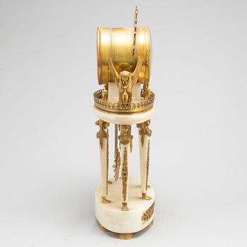 A French late 19th or early 20th century Empire style pendulum clock.