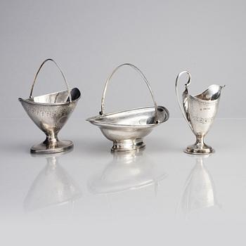 Two silver bowls and one creamer, London, England, 18th century.