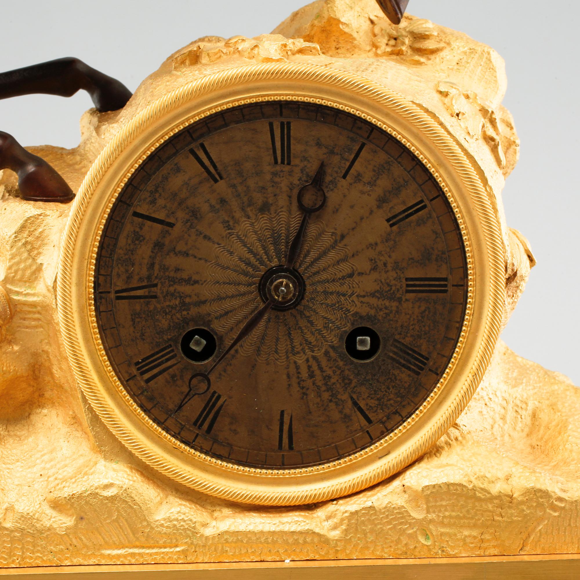 A late empire mantle piece clock, around mid 19th century.