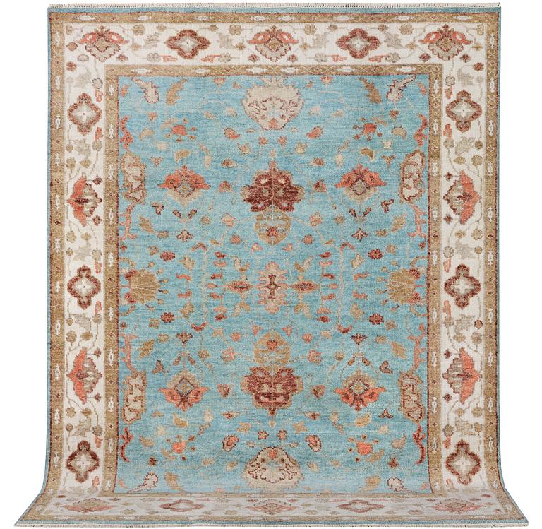 An oriental carpet with Mamluk-design, c. 303 x 239 cm.