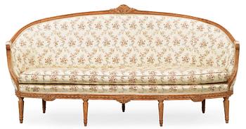 A Louis XVI 18th century sofa. Two later armchairs included.