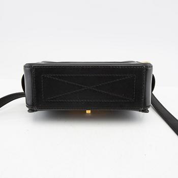 Alexander McQueen, "Camera Bag" purse.