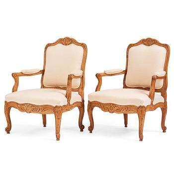 59. A pair of Swedish rococo fauteuils à la reine, later part of the 18th century.
