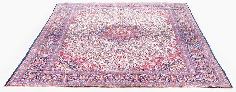 An antique silk Kashan carpet, central Persia (Iran) c. 378 x 259 cm.