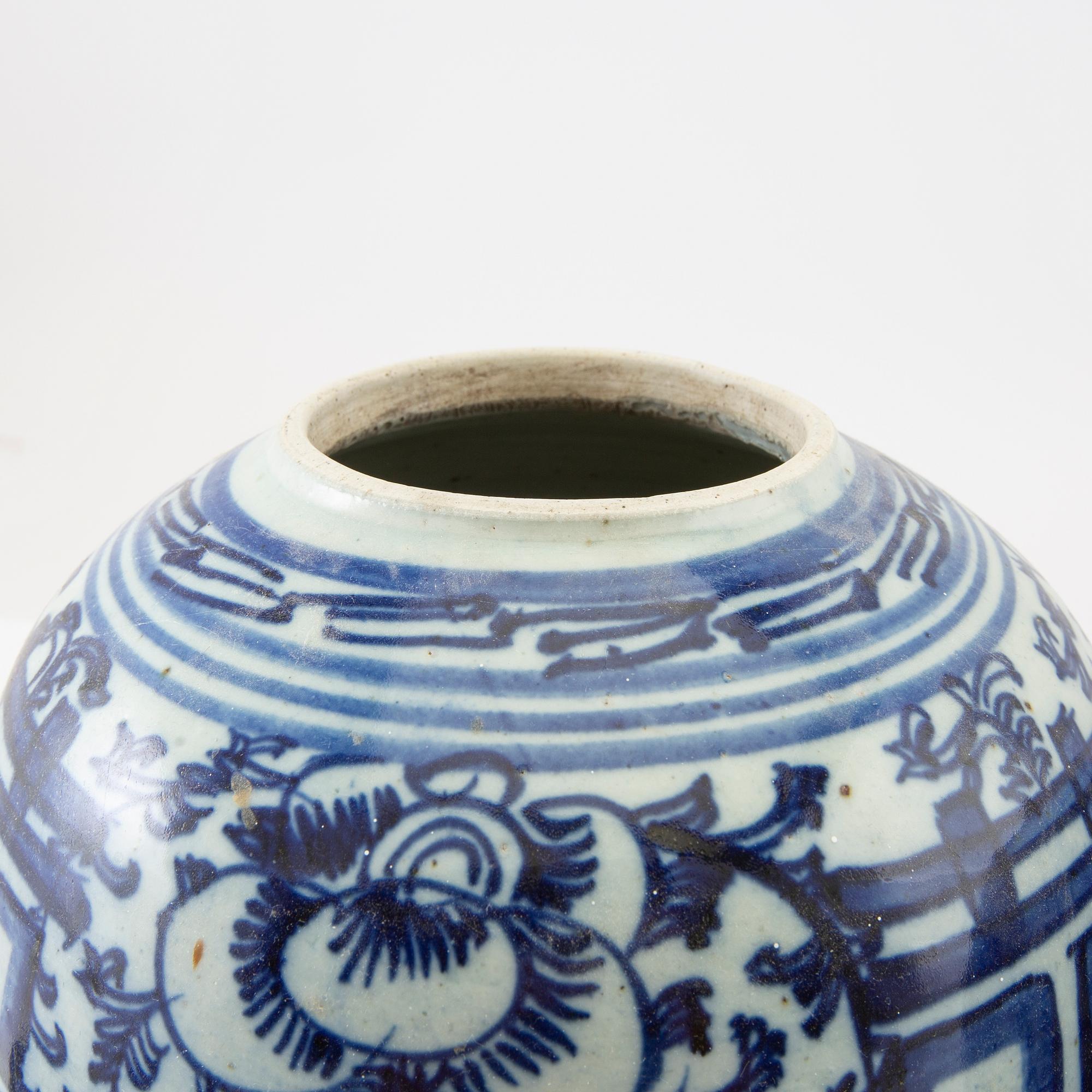 A set of two Chinese blue and white jars with covers, 20th century.