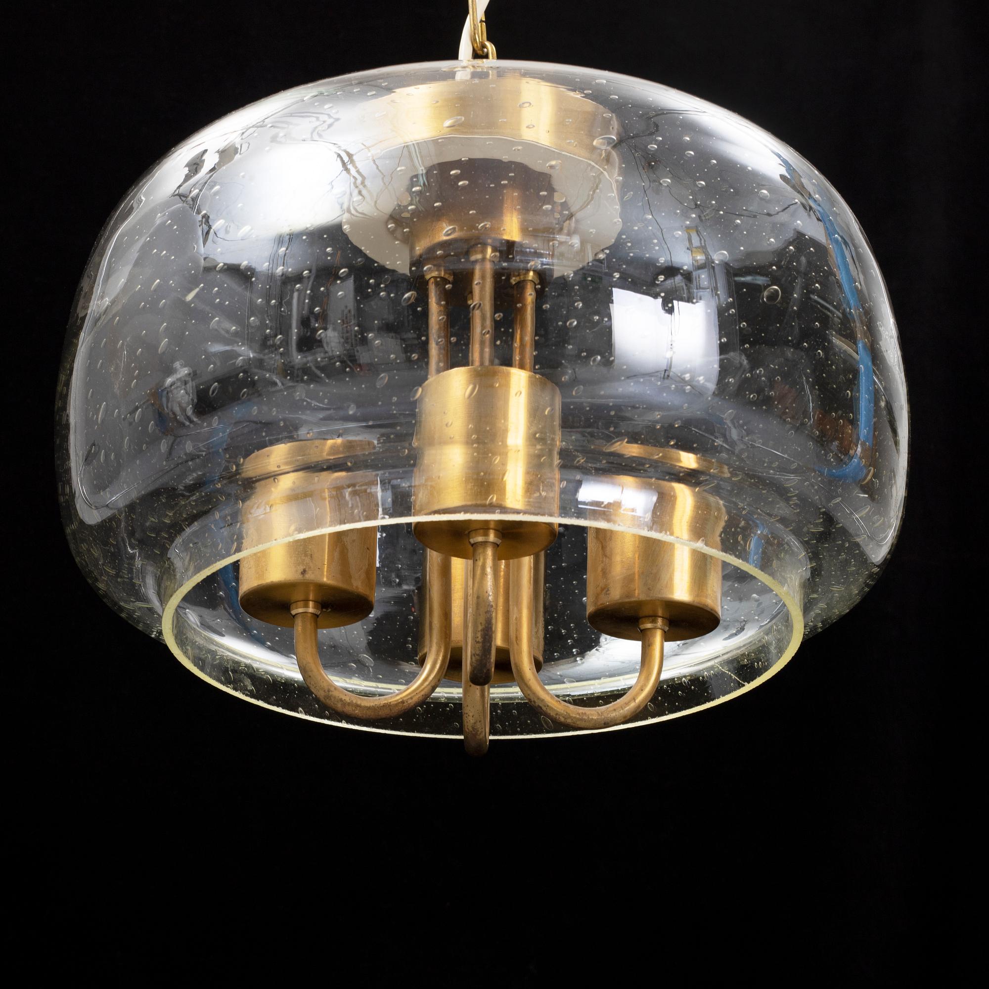 A 1960/70s glass and brass ceiling lamp.
