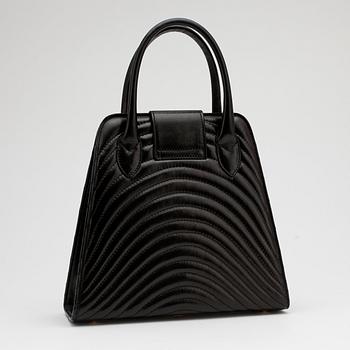 JEAN MICHEL NOUVEAU, a black leather top handle purse.