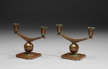 A pair of Sune Bäckström bronze candelabra, Sweden 1920's-1930'.