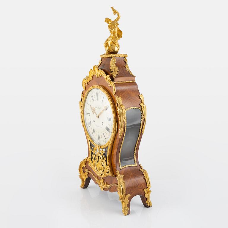 A rococo-style bracket clock, 20th century incorporating older elements.